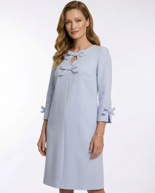 Bella Błękitna Elegancka Sukienka z Kokardkami