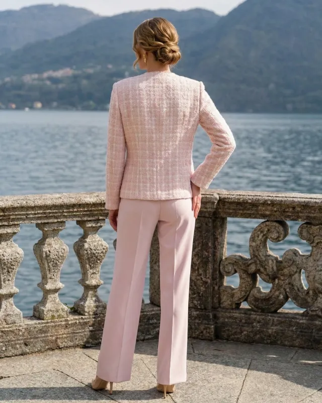 Elegant women's set with a Chanel-style jacket and trousers – powder pink