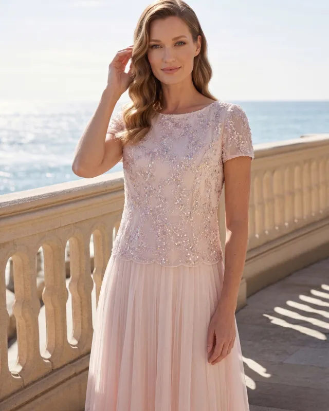 Plisowana sukienka midi z ozdobną cekinową górą