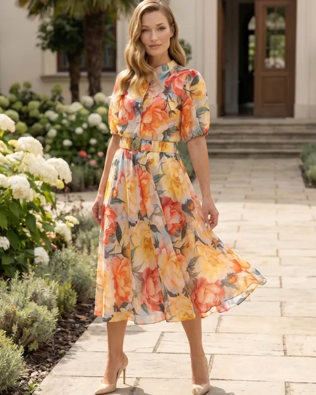 Floral midi dress with a stand-up collar and a belt with a silver buckle