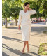 Costum ecru din jacard cu peplum și fundă | POZA